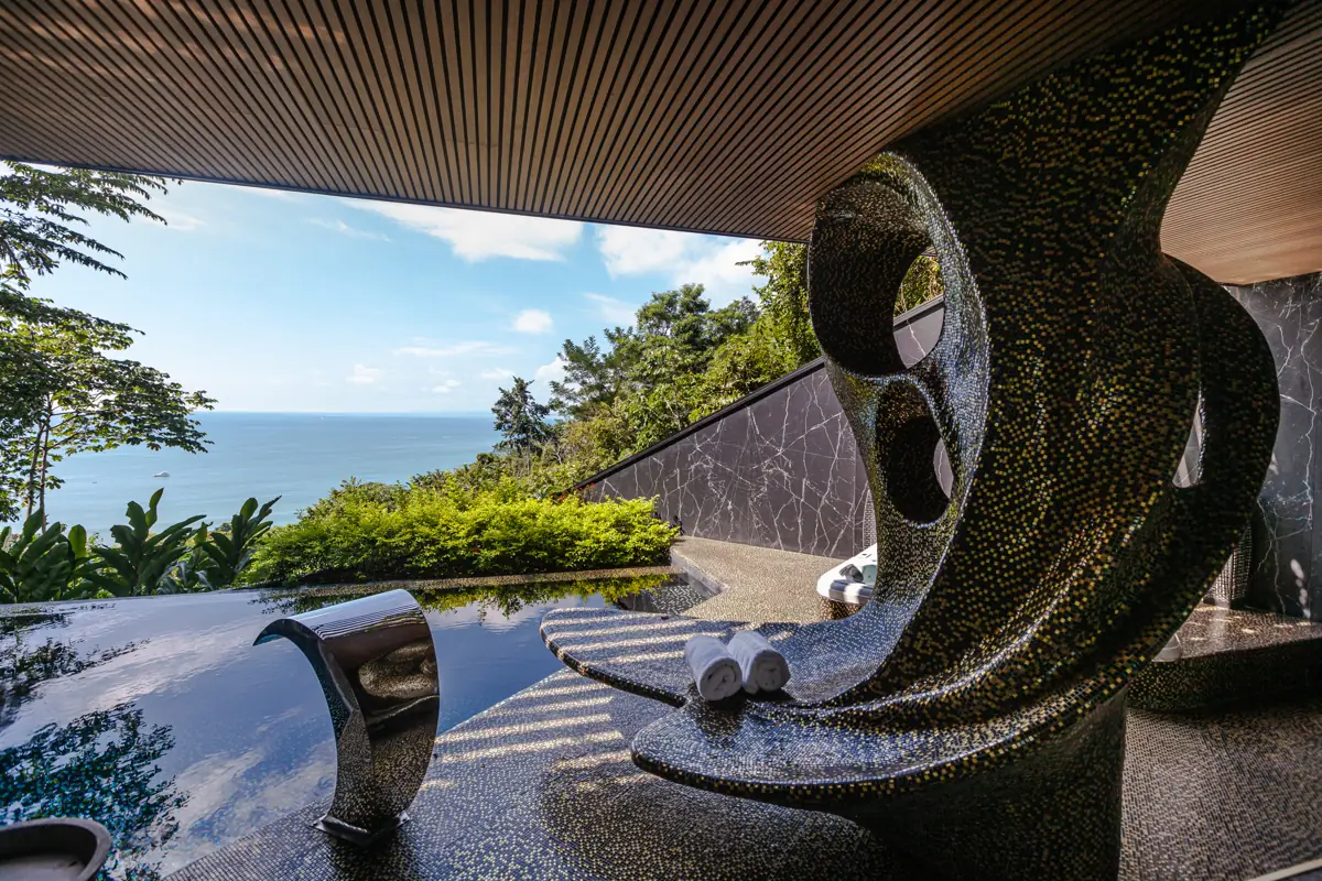 Steel wave sculpture over the pool, Makanda